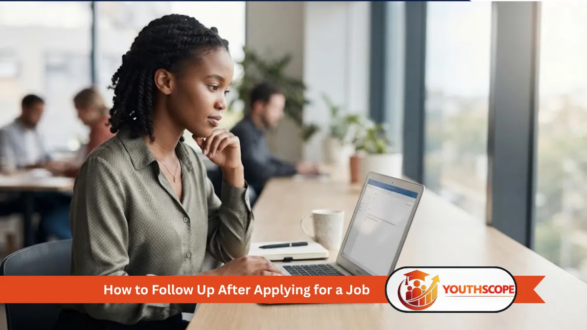 Young South African job seeker reviewing a job application on a laptop
